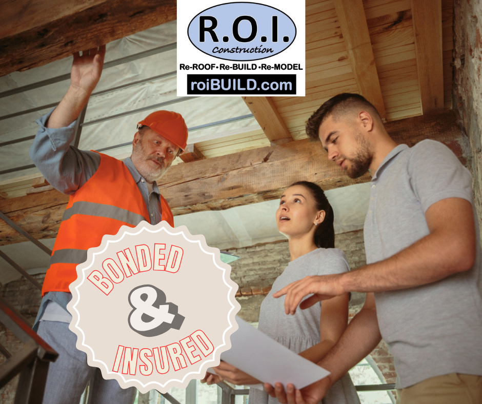 couple with bonded and insured roofing contractor