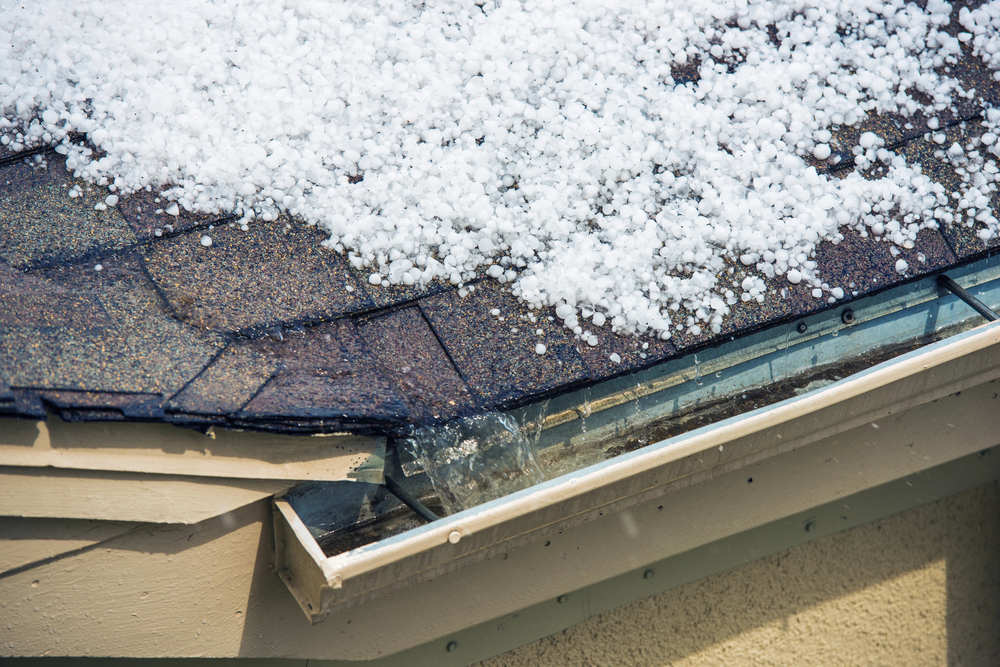 hail on roof with gutters